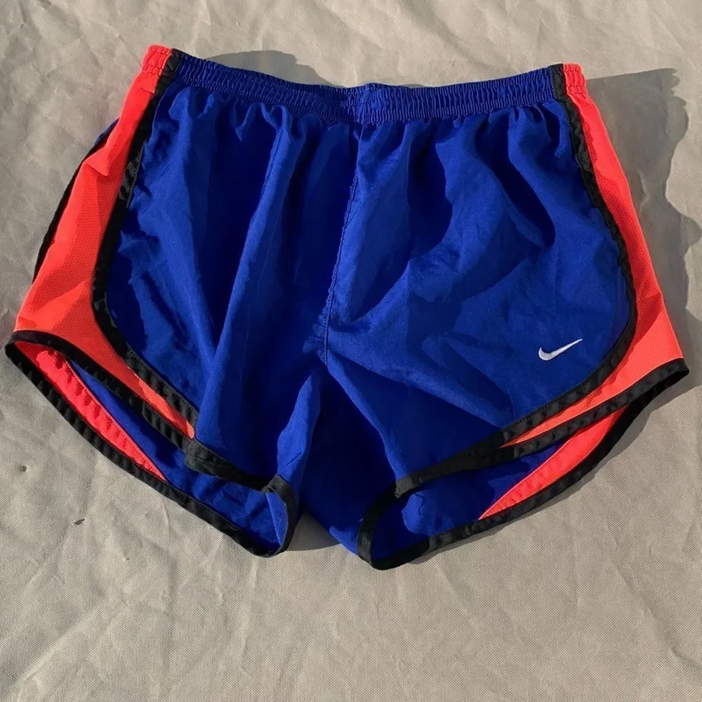 Nike royal blue and pink running shorts with liner size small